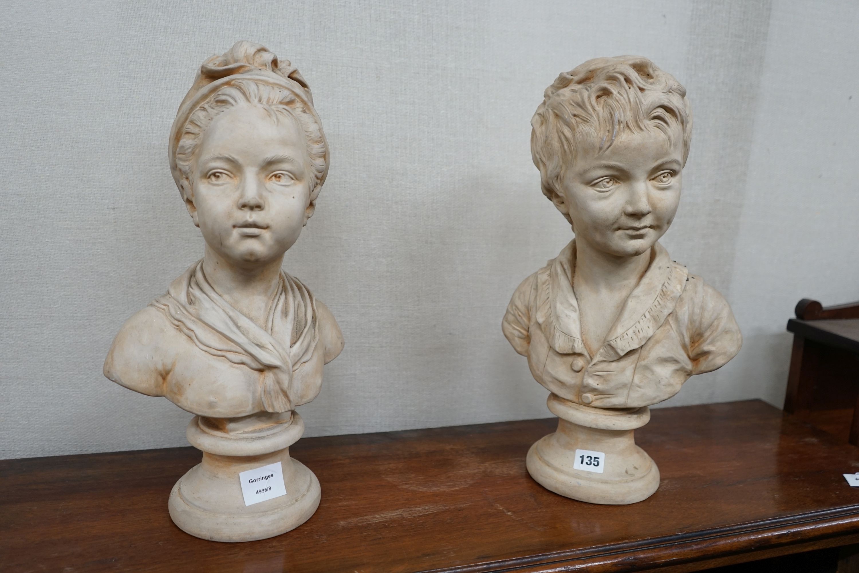 After Houdon - a pair of French painted terracotta busts of Louise and Alexandre Brongniart, larger height 46cm